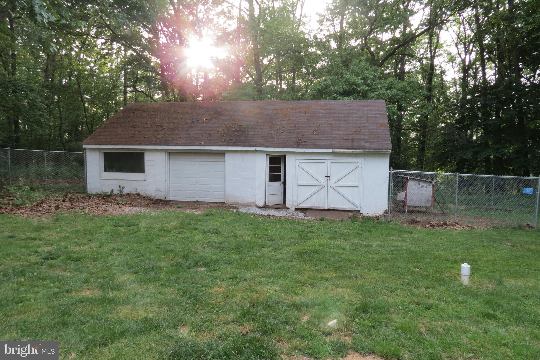 4822 Ridge Road Mount Airy, MD 21771 - Photo 8 of 38 Detached garage with attached shed.
