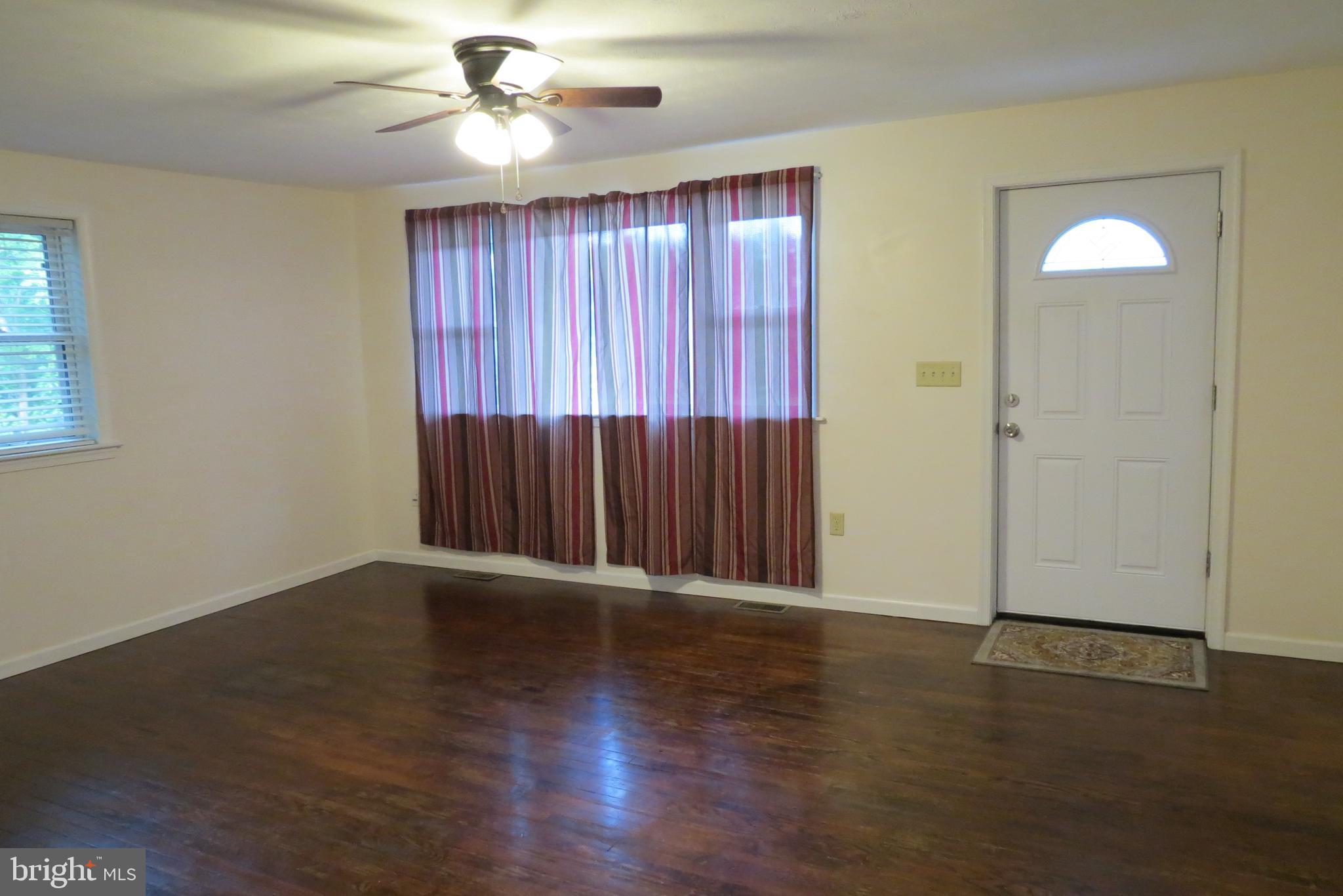 4822 Ridge Road Mount Airy, MD 21771 - Photo 9 of 38 Entry into large living rm, hardwood floors.