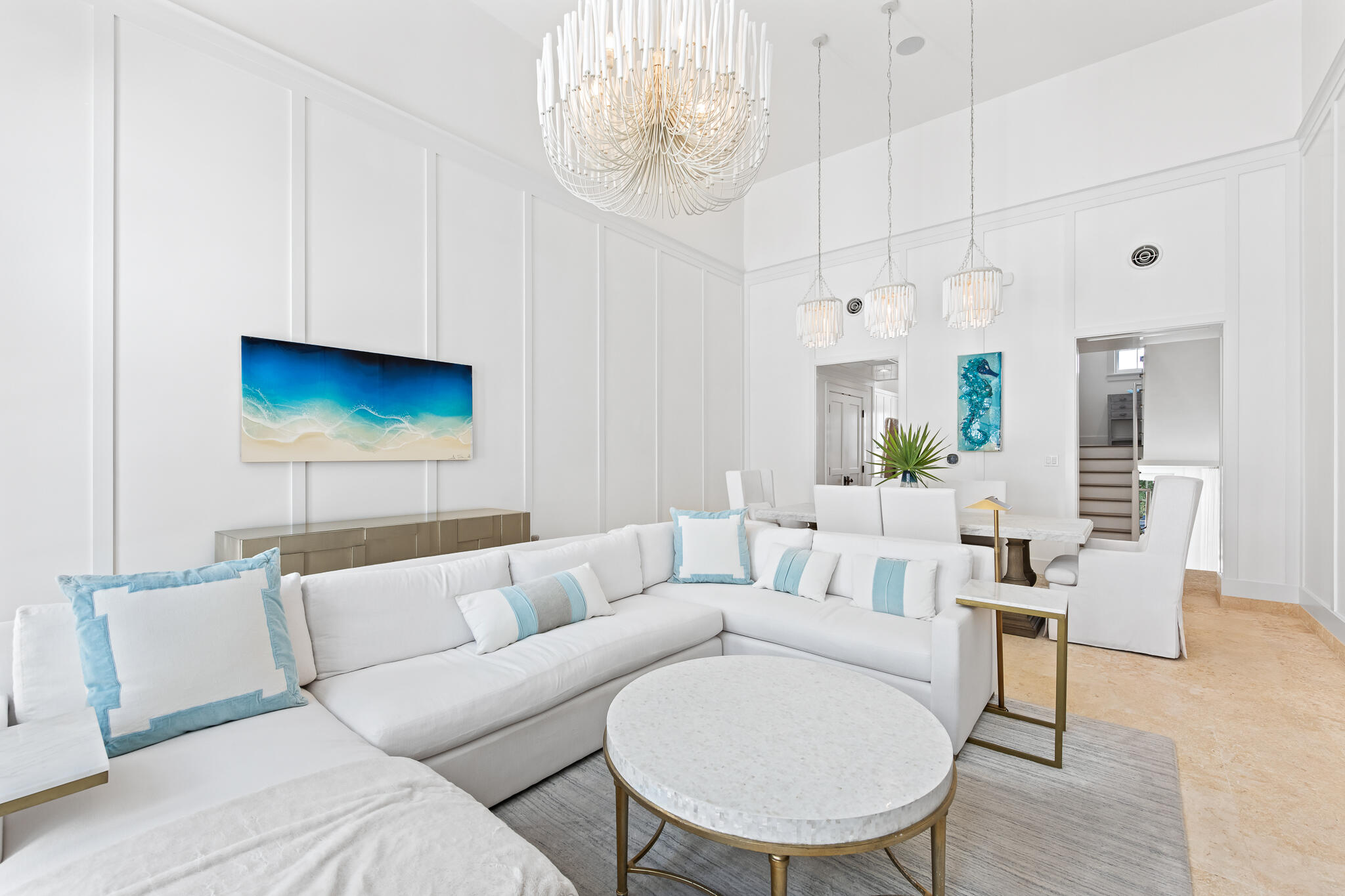 163 North Castle Harbour Dr Inlet Beach, Unit U38 Inlet Beach, FL 32461 - Photo 16 of 55 a living room with furniture a chandelier and a flat screen tv