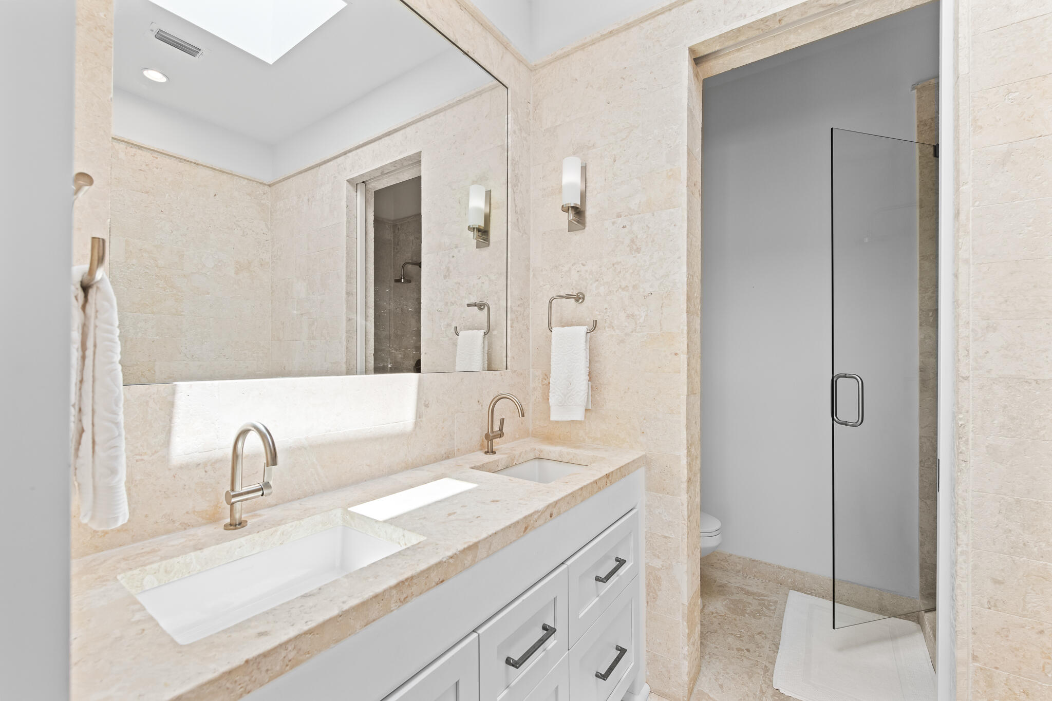 163 North Castle Harbour Dr Inlet Beach, Unit U38 Inlet Beach, FL 32461 - Photo 28 of 55 a bathroom with a double vanity sink and a mirror