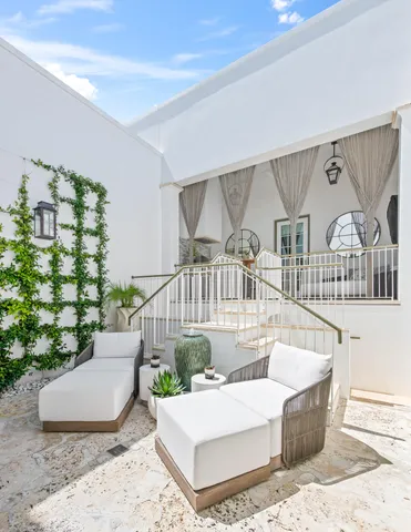 a view of a floor to ceiling window and wooden floor