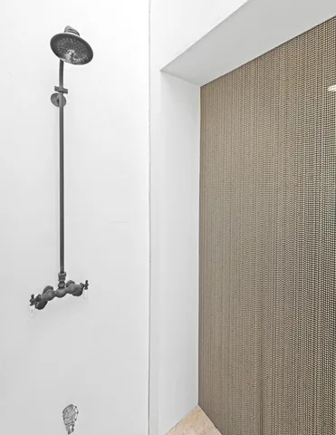 a view of a balcony with wooden floor