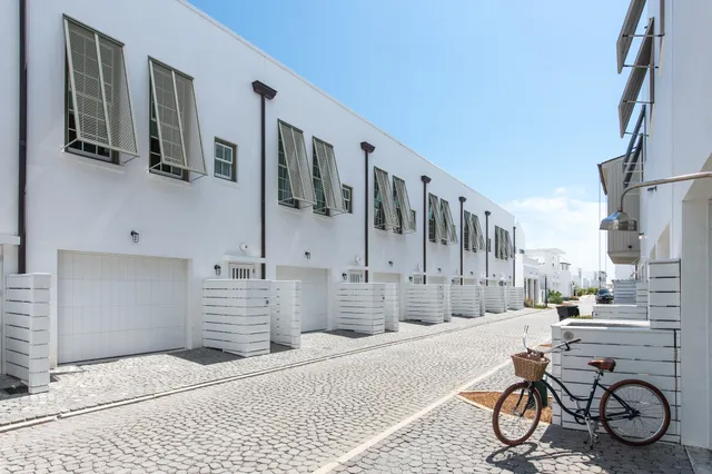 a city street lined with buildings and a street