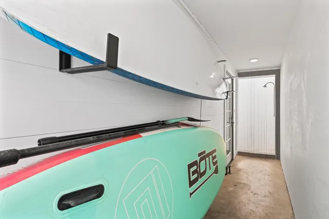 a view of a house with patio and garden