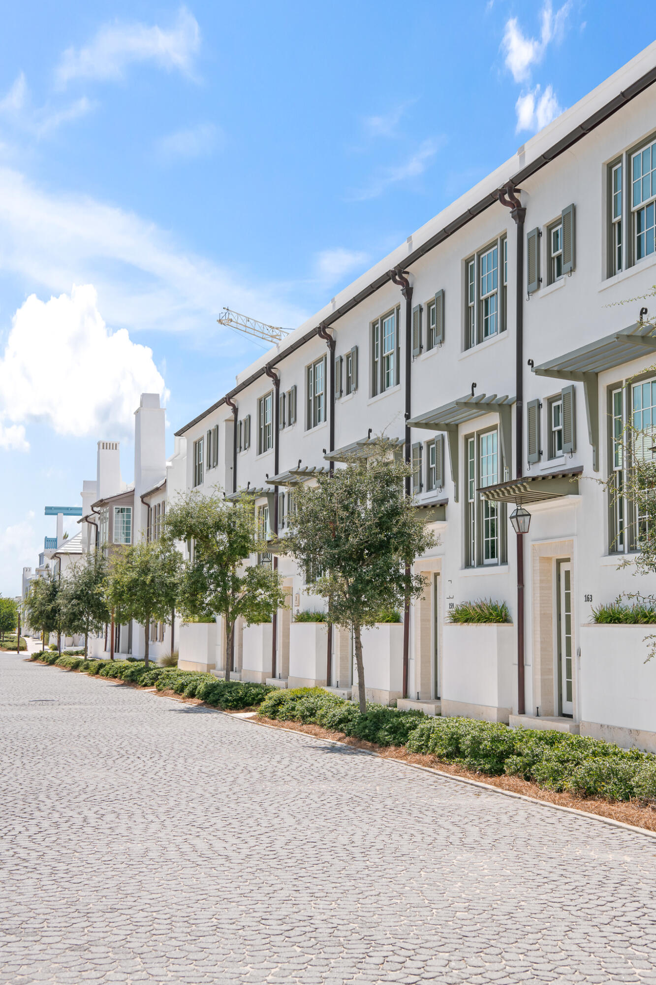163 North Castle Harbour Dr Inlet Beach, Unit U38 Inlet Beach, FL 32461 - Photo 49 of 55 a city street lined with buildings and a street