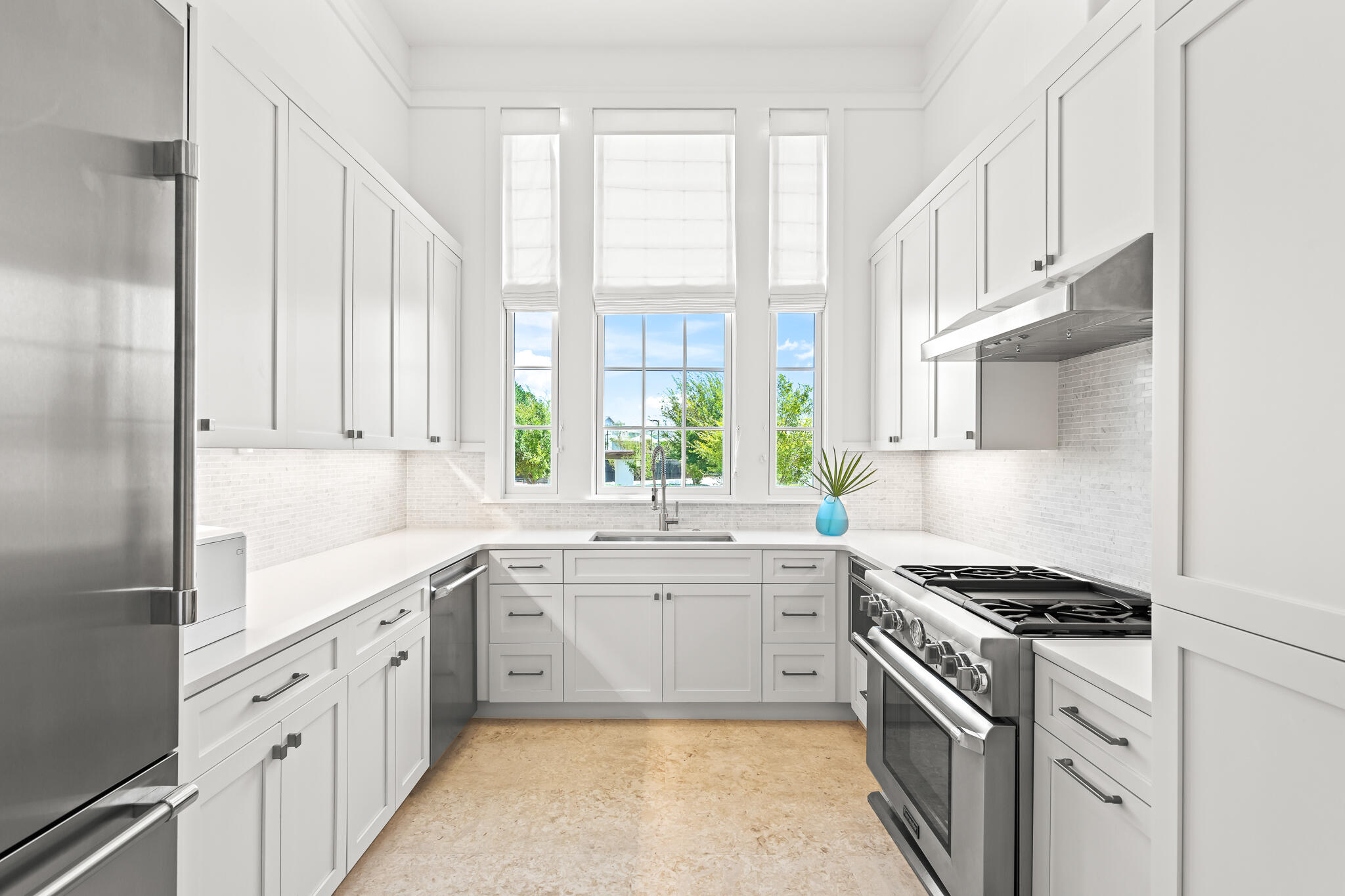 163 North Castle Harbour Dr Inlet Beach, Unit U38 Inlet Beach, FL 32461 - Photo 9 of 55 a kitchen with a sink stove top oven and cabinets