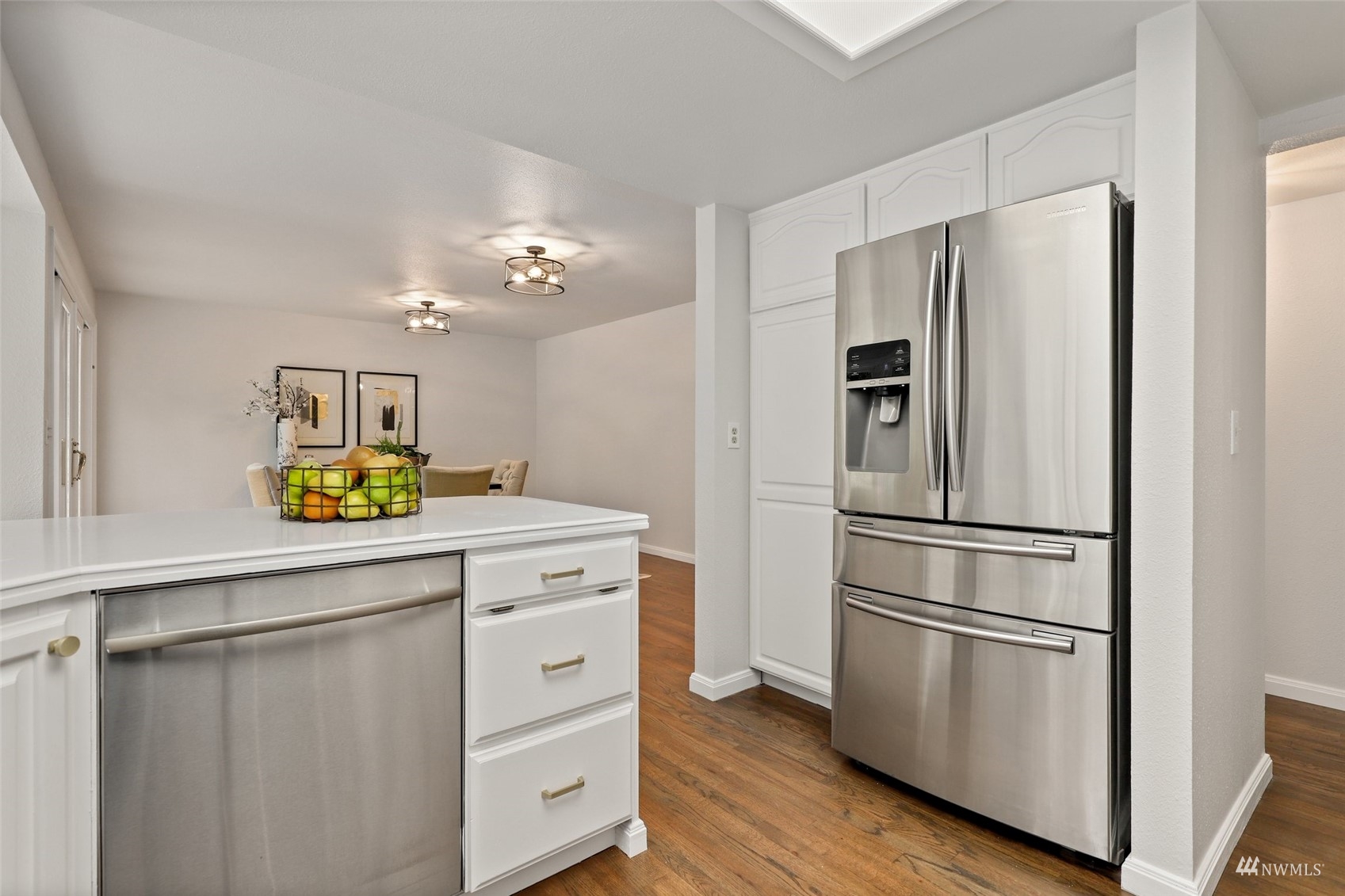 17521 5th Avenue West Bothell, WA 98012 - Photo 13 of 40 a kitchen with stainless steel appliances a refrigerator and a stove