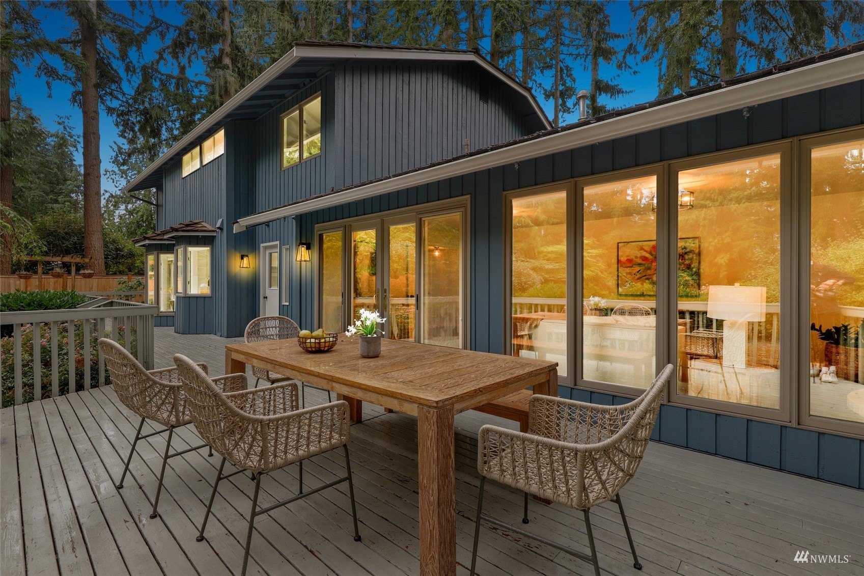 17521 5th Avenue West Bothell, WA 98012 - Photo 19 of 40 a view of a patio with table and chairs and wooden floor