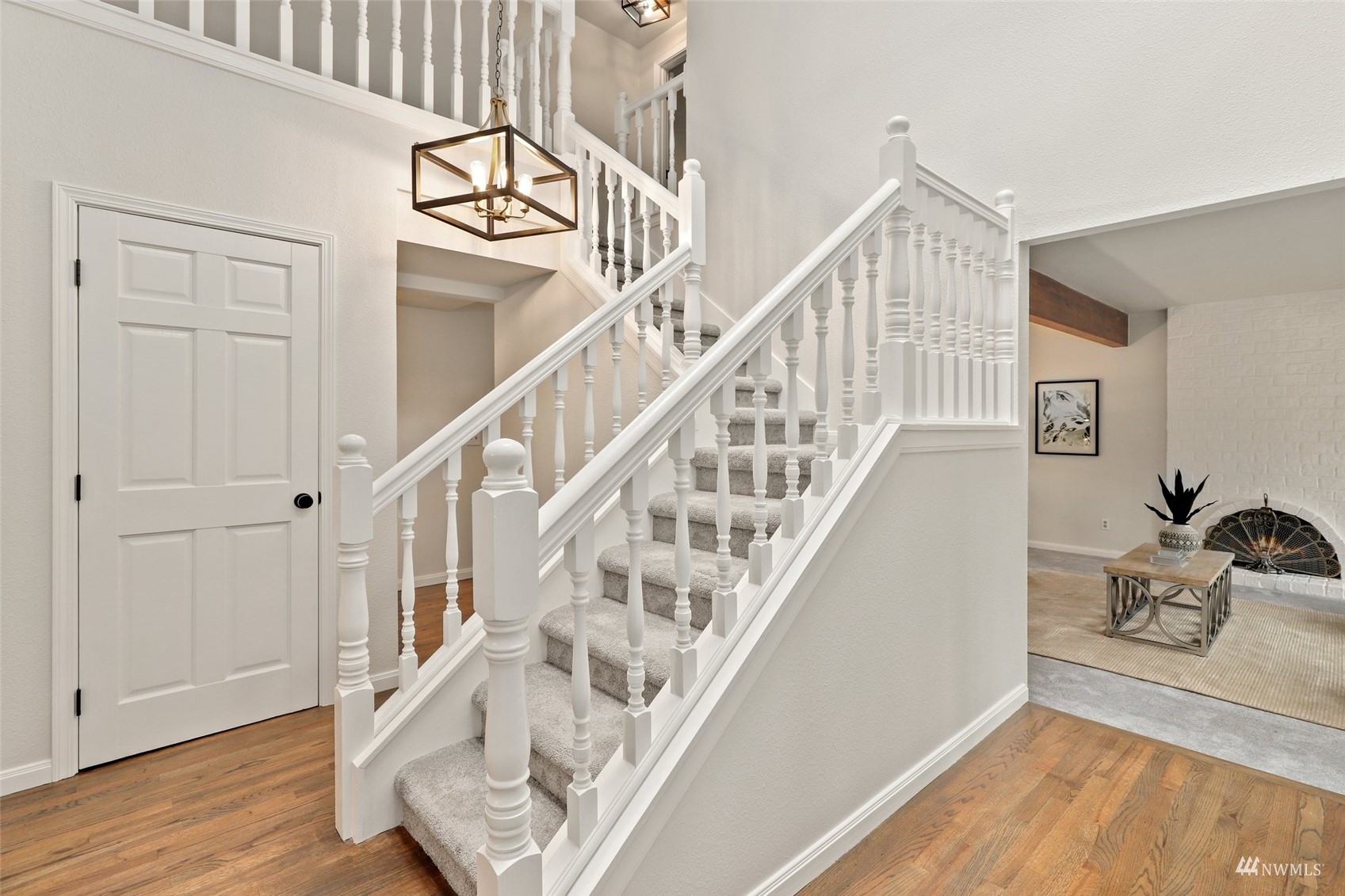 17521 5th Avenue West Bothell, WA 98012 - Photo 24 of 40 a view of entryway and hall with wooden floor