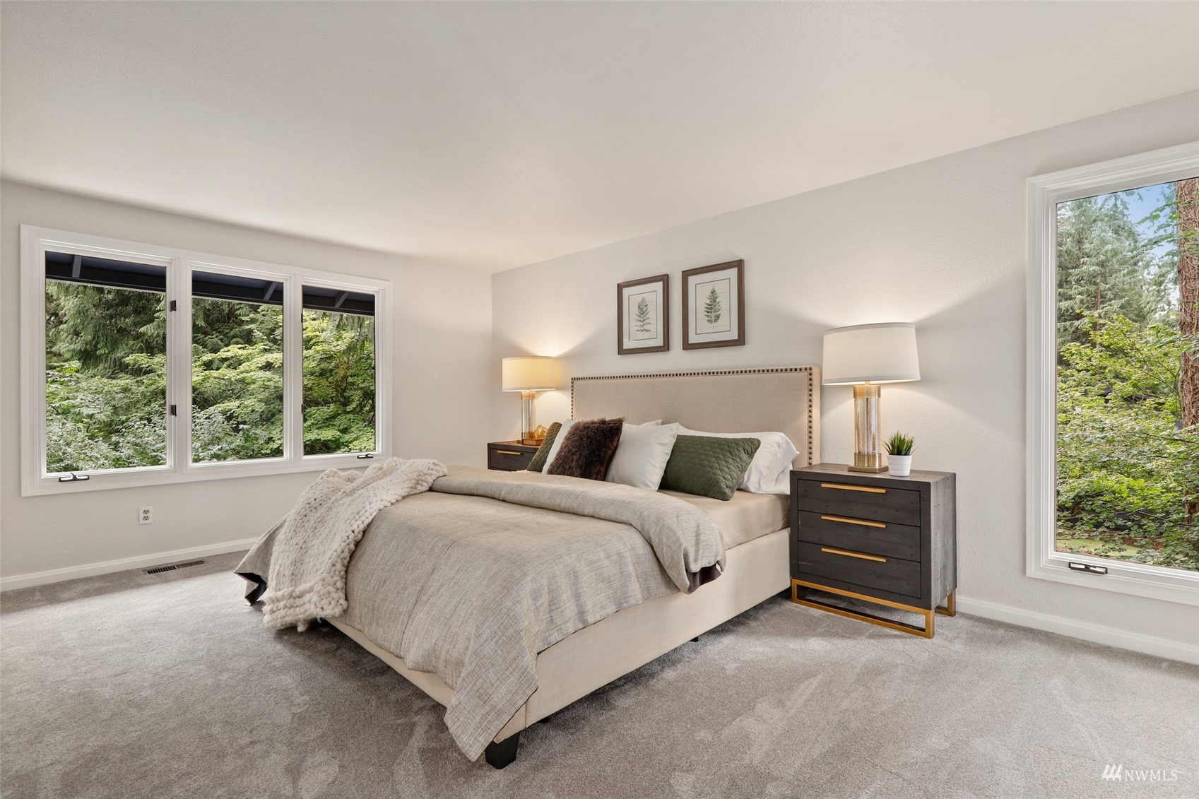 17521 5th Avenue West Bothell, WA 98012 - Photo 25 of 40 a spacious bedroom with a bed and a large window
