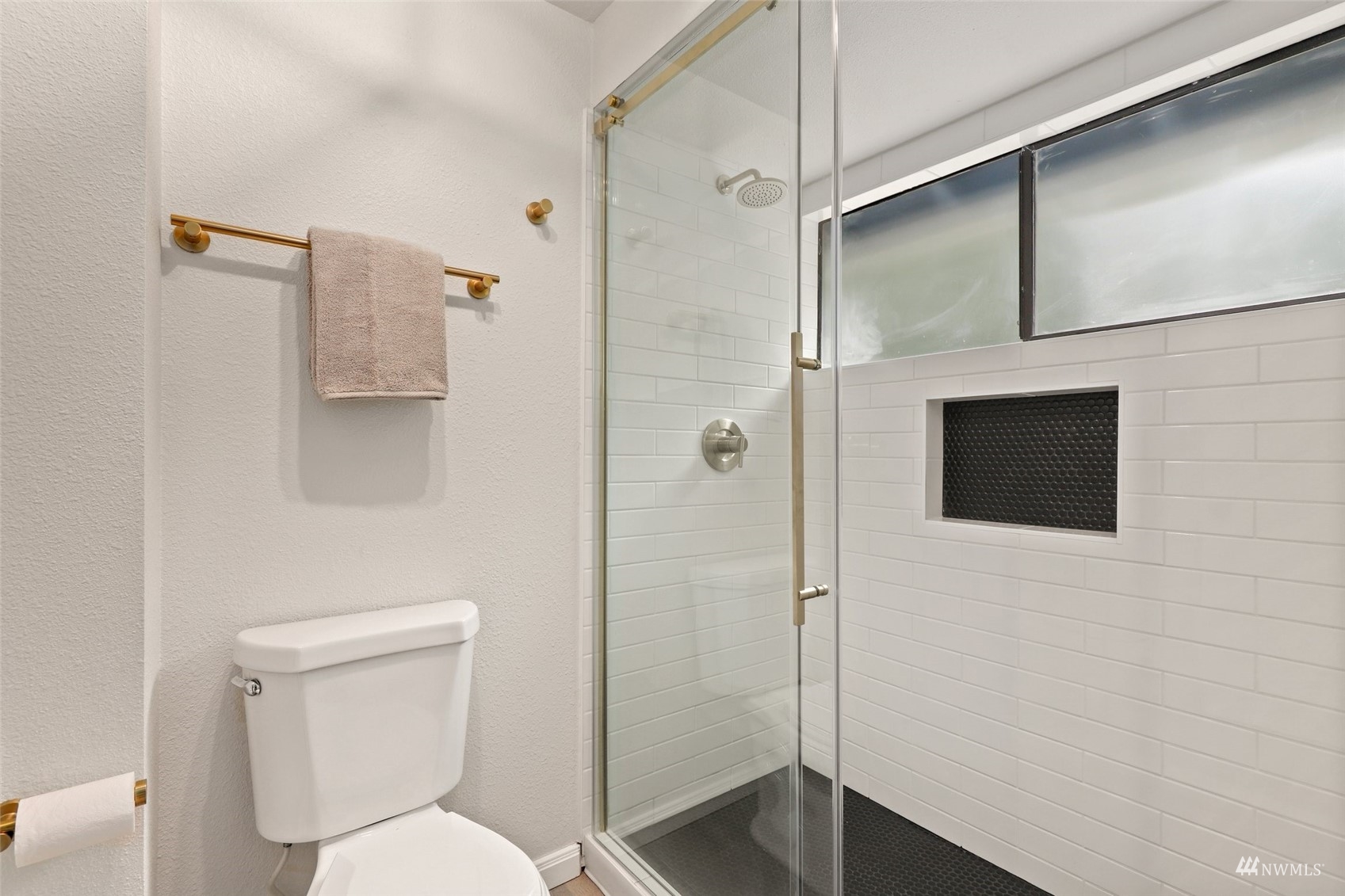 17521 5th Avenue West Bothell, WA 98012 - Photo 28 of 40 a bathroom with a toilet and a shower