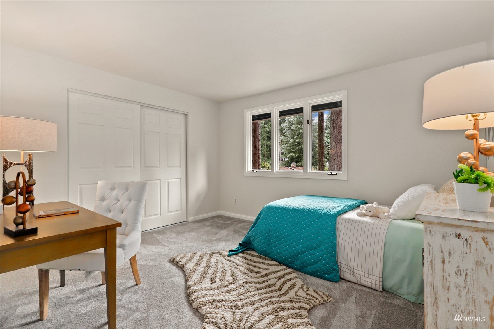 17521 5th Avenue West Bothell, WA 98012 - Photo 30 of 40 a bedroom with furniture and a window