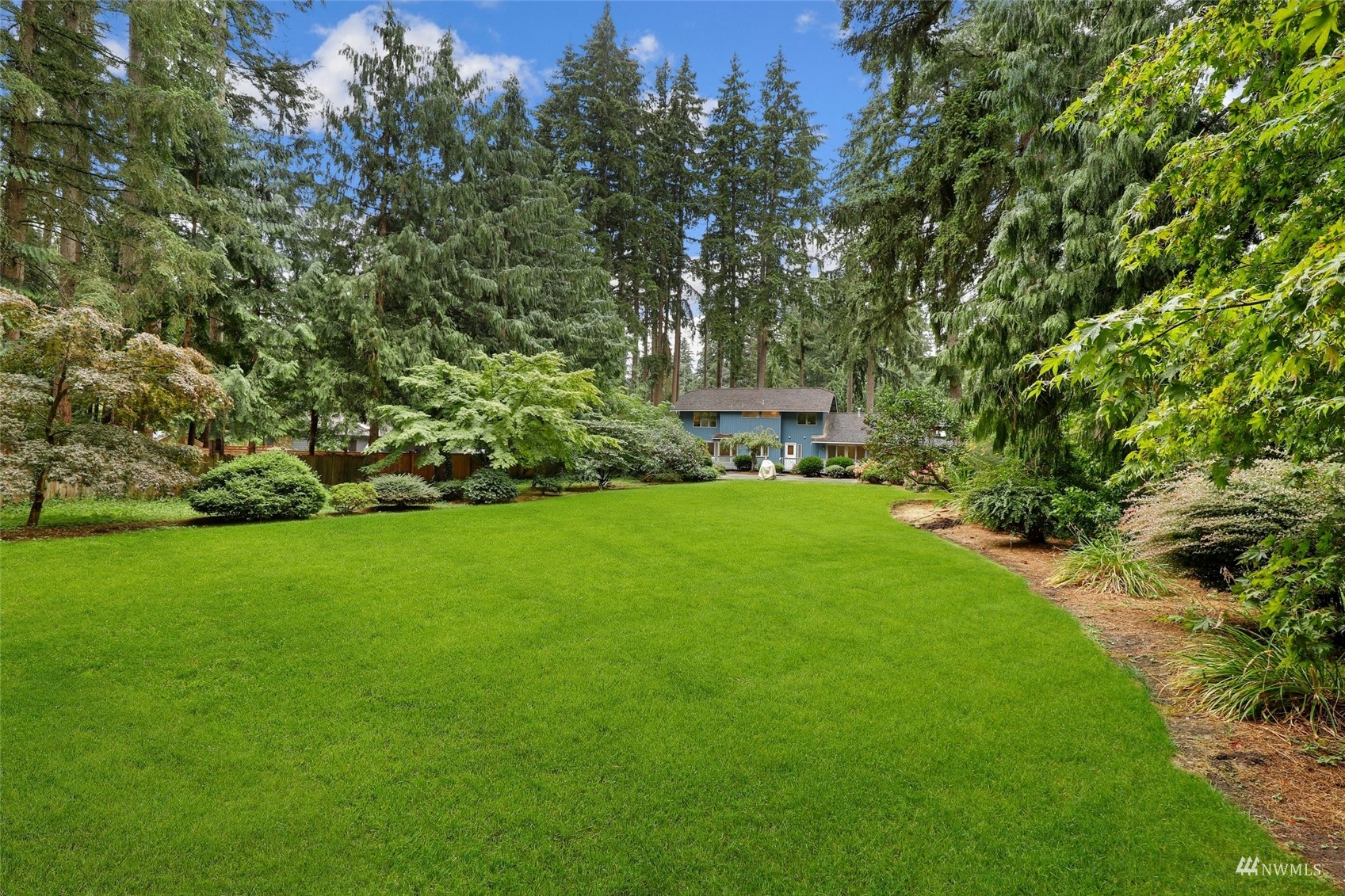 17521 5th Avenue West Bothell, WA 98012 - Photo 36 of 40 a view of a backyard with a garden