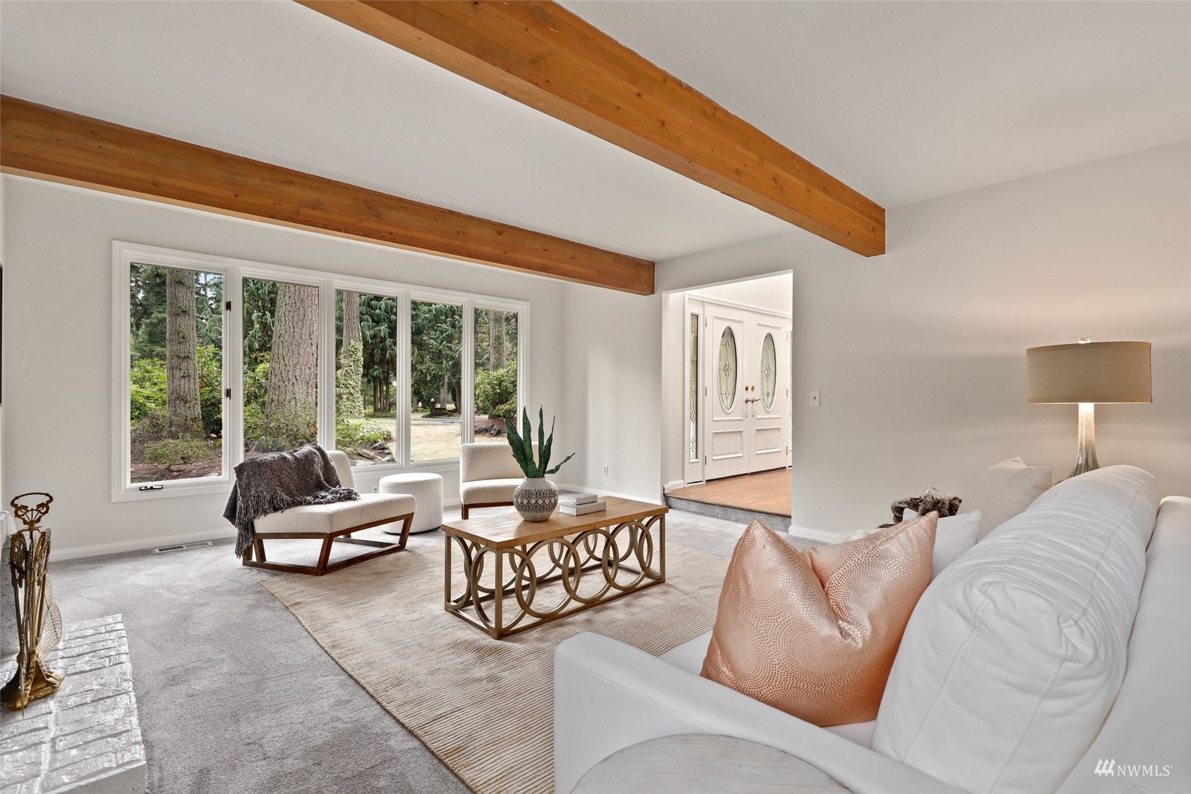 17521 5th Avenue West Bothell, WA 98012 - Photo 5 of 40 a living room with furniture and floor to ceiling windows