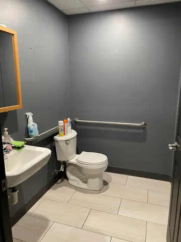 an empty room with wooden floor