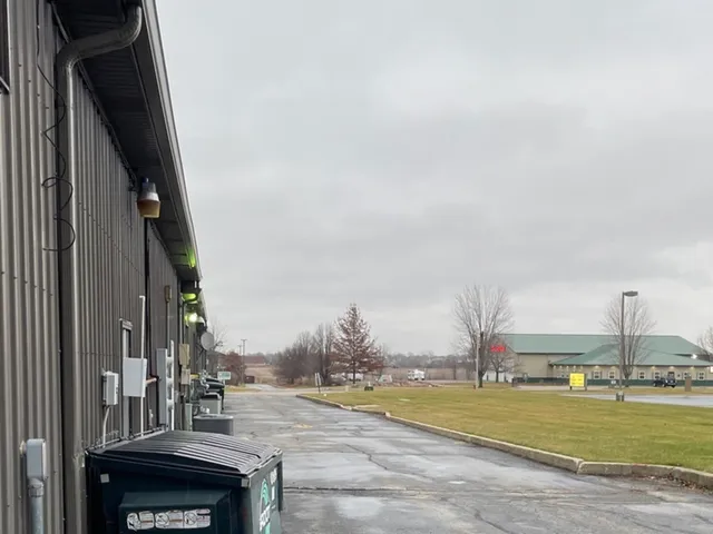 a view of hallway with wooden floor