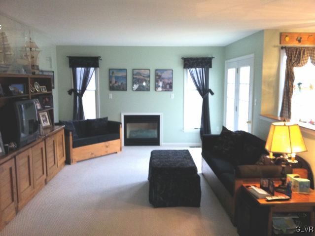 129 West Aluta Mill Road Nazareth, PA 18064 - Photo 11 of 39 a living room with furniture and a wooden floor
