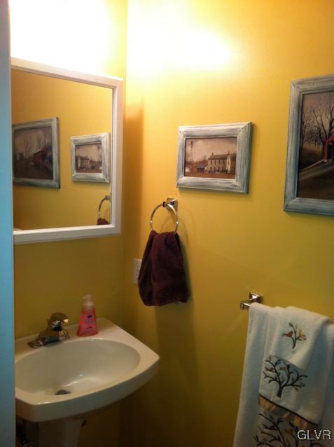 129 West Aluta Mill Road Nazareth, PA 18064 - Photo 14 of 39 a bathroom with a sink and a mirror