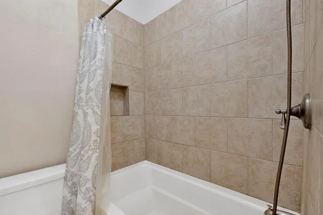a bathroom with a bathtub