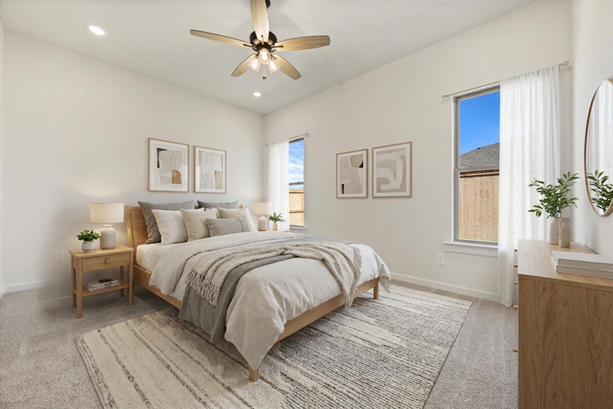 7003 53rd Street Lubbock, TX 79407 - Photo 13 of 25 a spacious bedroom with a large bed and a chandelier