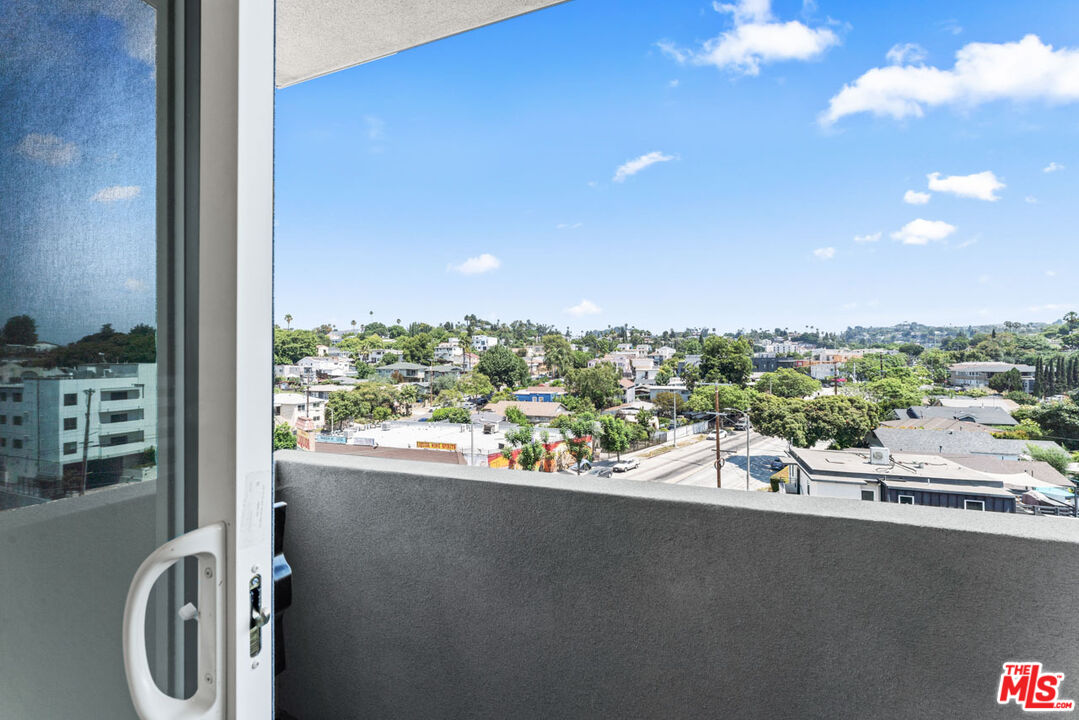 3105 Bellevue Avenue, Unit 204 Los Angeles, CA 90026 - Photo 10 of 20 a view of a city street from a balcony