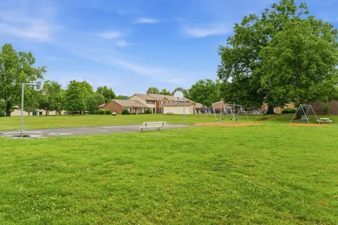 a view of a house with a big yard