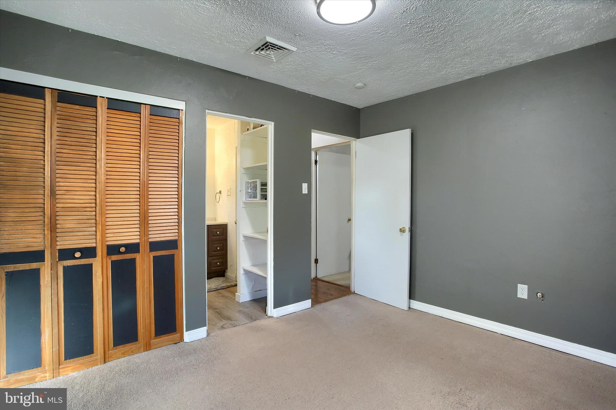 4709 Delbrook Road Mechanicsburg, PA 17050 - Photo 20 of 34 an empty room with windows