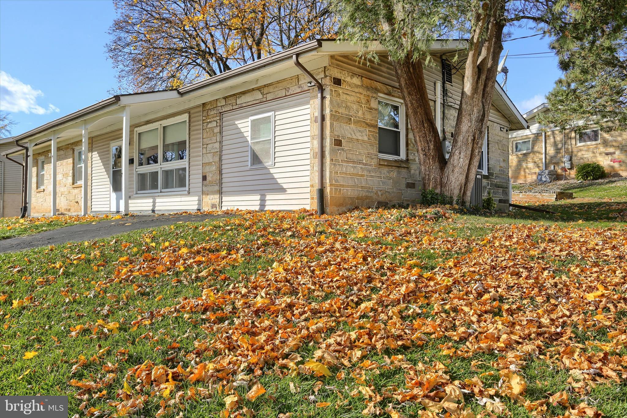 4709 Delbrook Road Mechanicsburg, PA 17050 - Photo 2 of 34 a house with trees in front of it