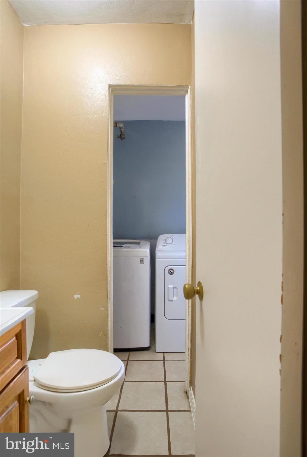 4709 Delbrook Road Mechanicsburg, PA 17050 - Photo 22 of 34 a white toilet sitting next to a bathroom sink