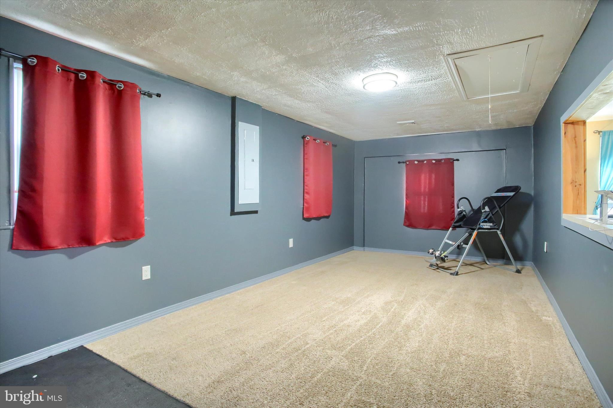 4709 Delbrook Road Mechanicsburg, PA 17050 - Photo 23 of 34 a room with furniture and a window