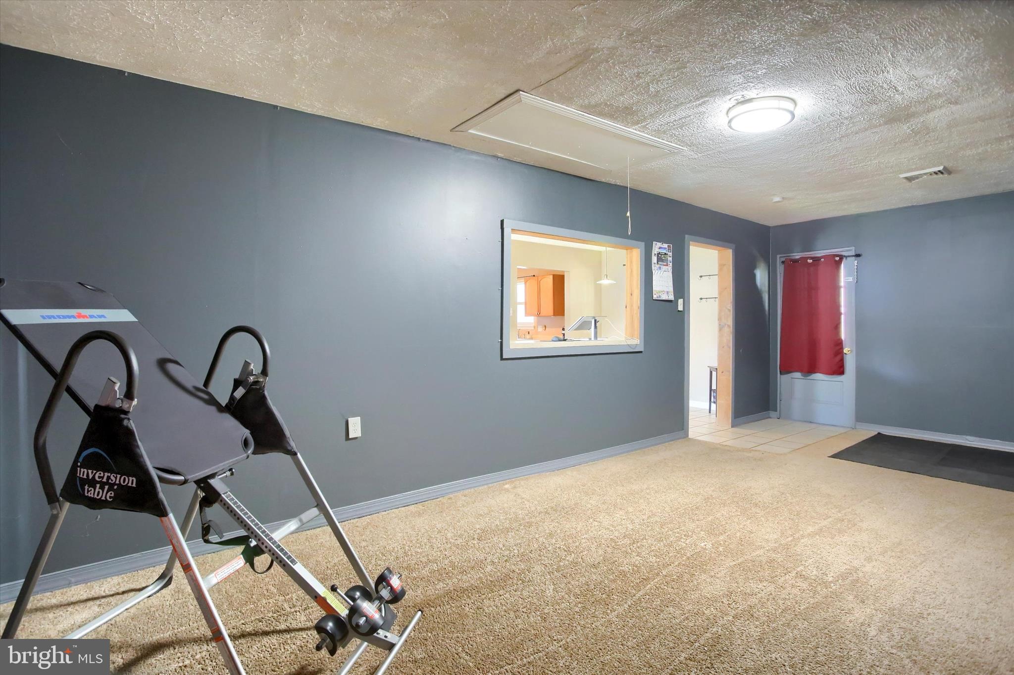 4709 Delbrook Road Mechanicsburg, PA 17050 - Photo 24 of 34 a view of an empty room with windows