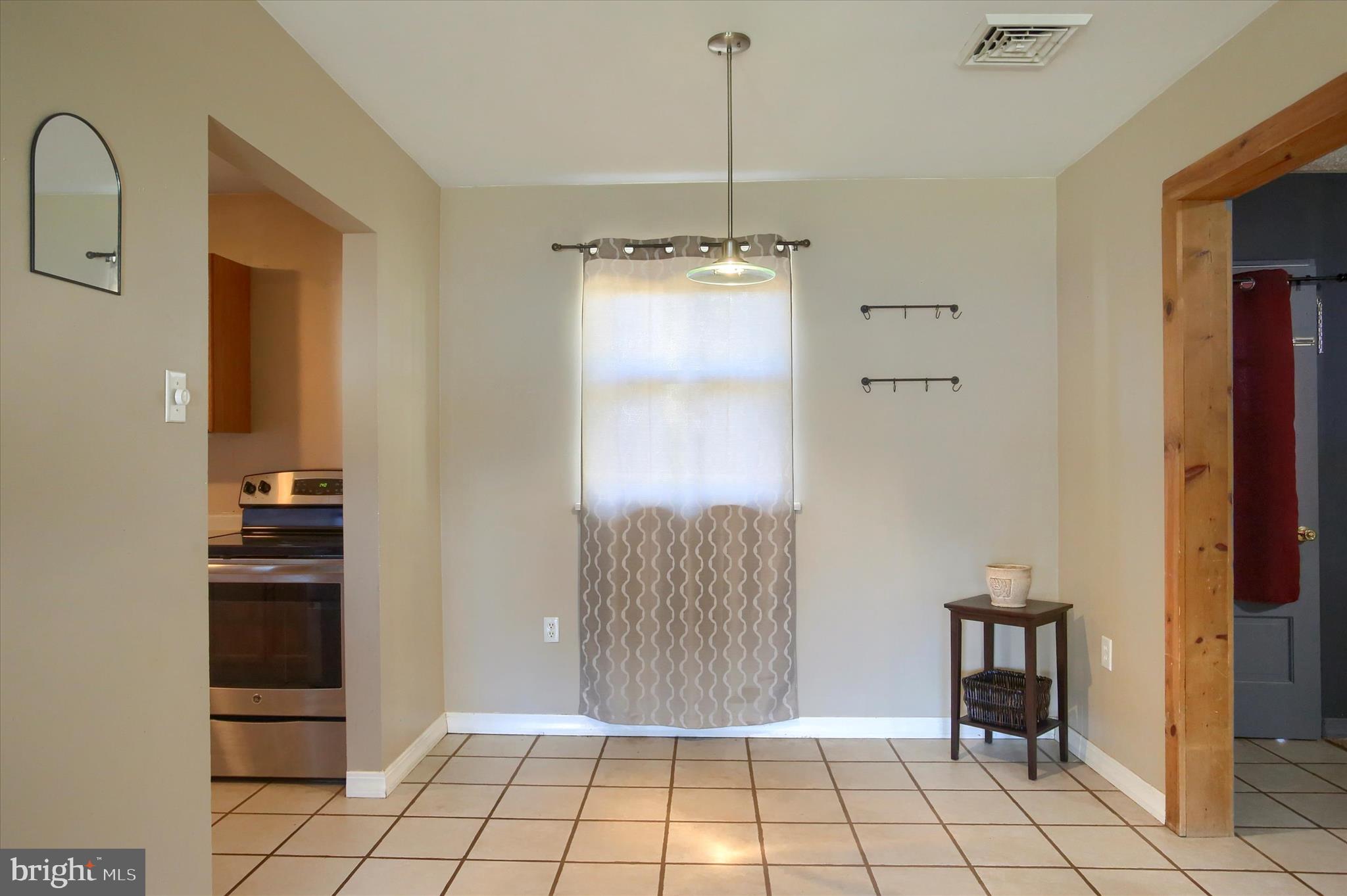 4709 Delbrook Road Mechanicsburg, PA 17050 - Photo 9 of 34 a view of an entryway with a cabinet