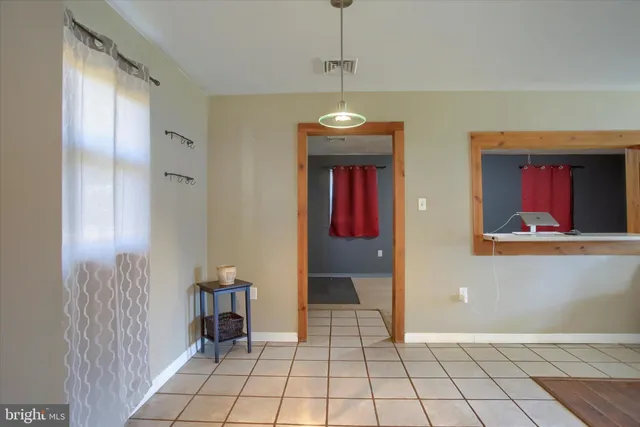 a view of entryway with chandelier