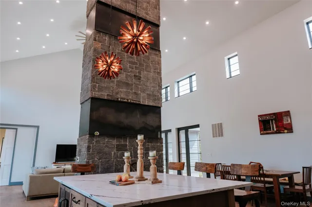 a view of a workspace with furniture