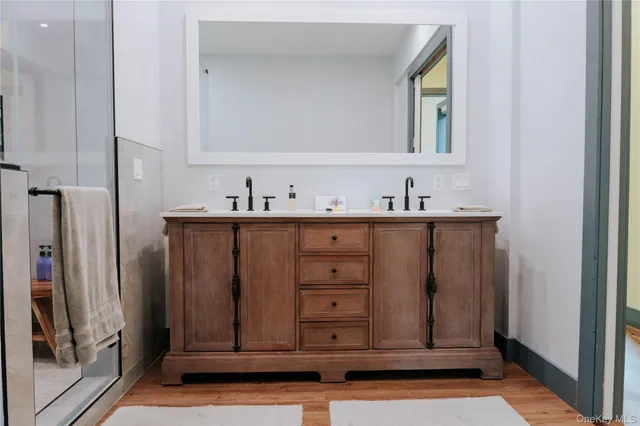 a view of cabinets and wooden floor