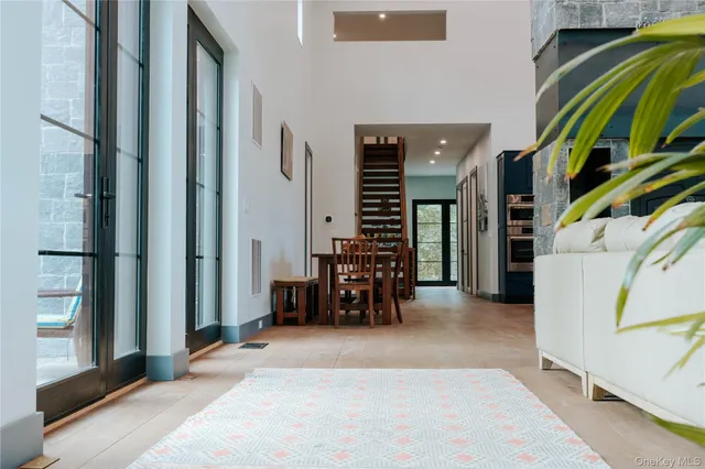 a view of a livingroom with furniture and a couch