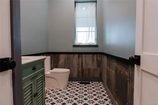 a bathroom with a sink and a toilet