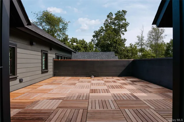 a view of outdoor space with deck and yard