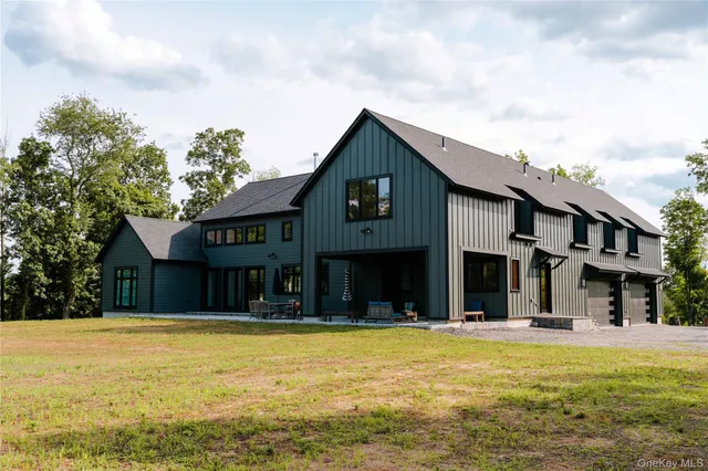 a front view of a building with a swimming pool