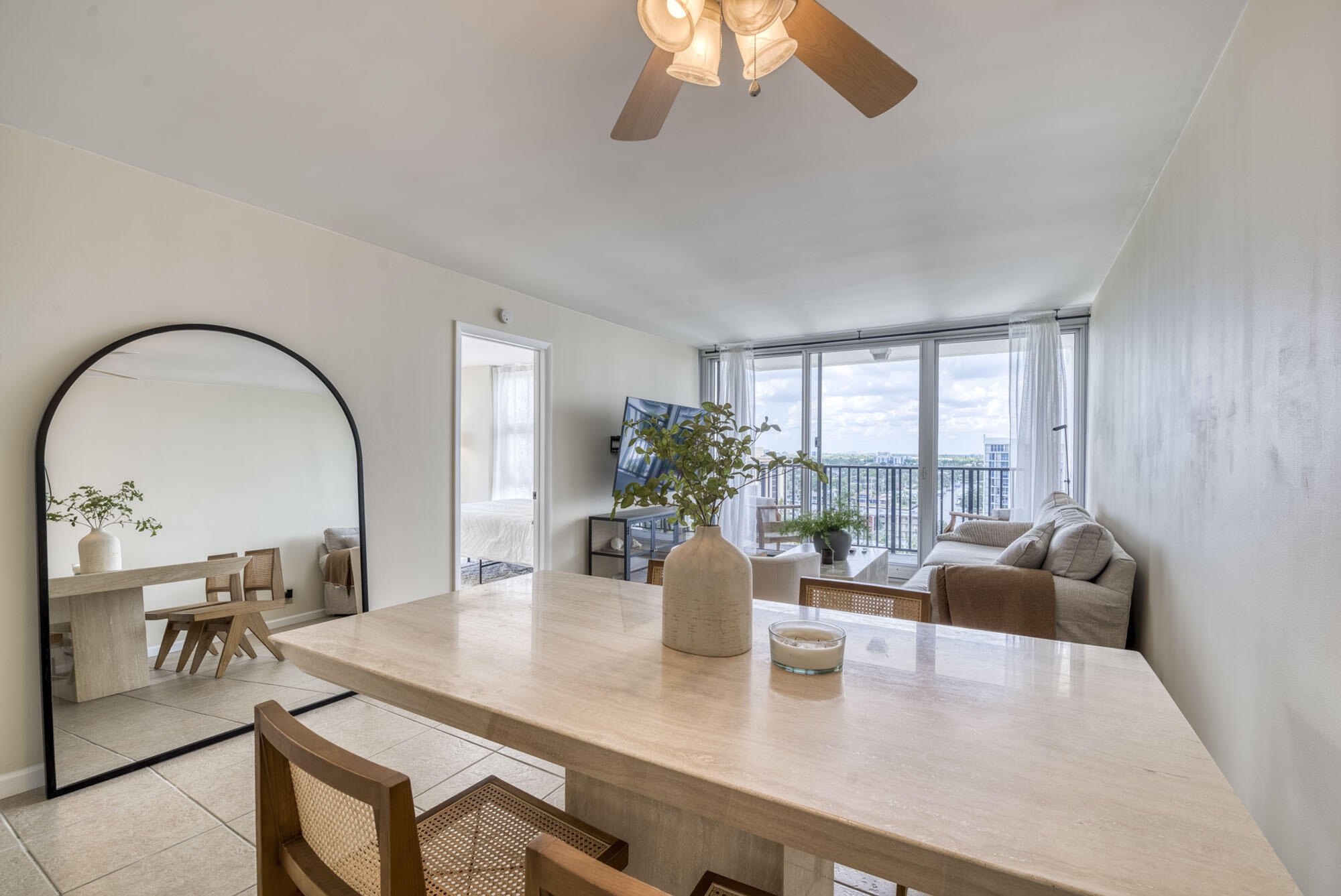 525 North Ocean Boulevard, Unit 1215 Pompano Beach, FL 33062 - Photo 3 of 16 a view of a dining room with furniture window and outside view