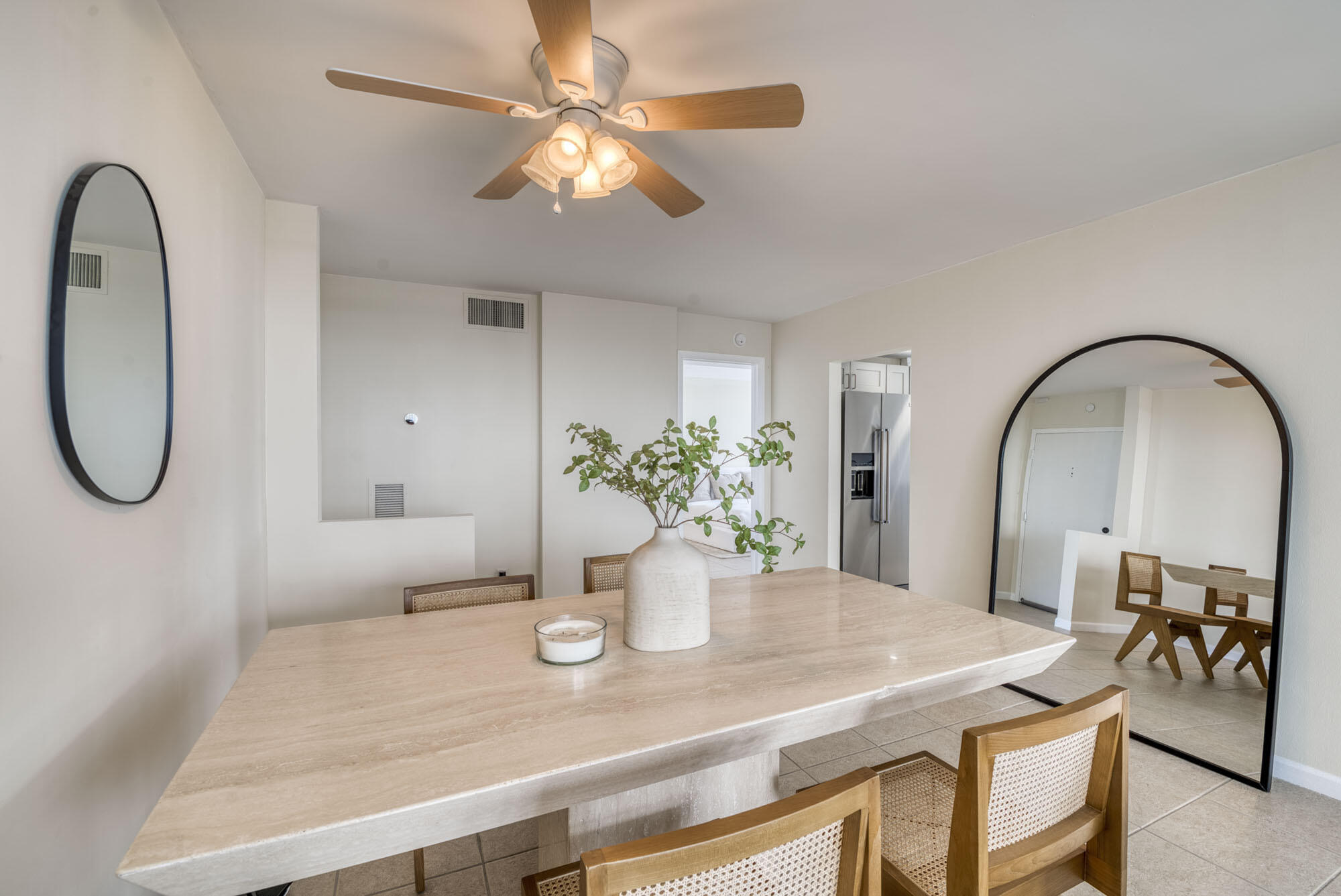 525 North Ocean Boulevard, Unit 1215 Pompano Beach, FL 33062 - Photo 7 of 16 a dining room with table & chairs