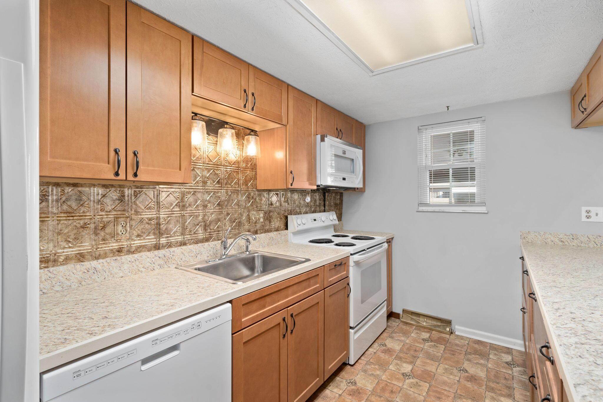 5123 Ranstead Court Columbus, OH 43220 - Photo 6 of 48 Plenty of room for all the cooks in the galley kitchen