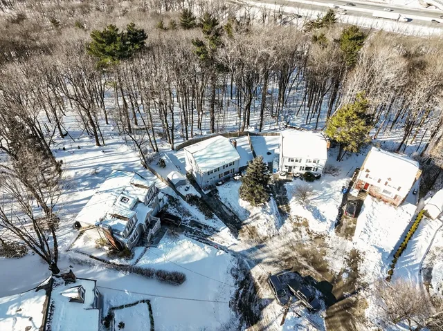 a view of a backyard of the house
