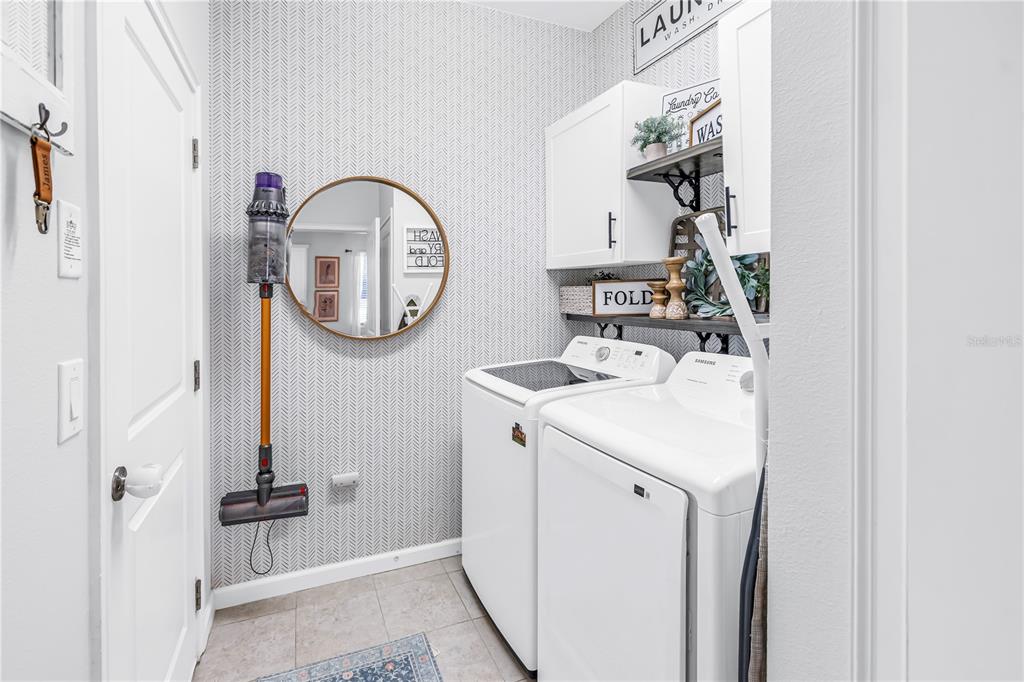 13229 Orca Sound Drive Riverview, FL 33579 - Photo 20 of 37 a bathroom with a sink and a mirror