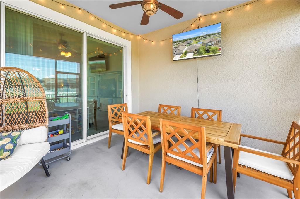 13229 Orca Sound Drive Riverview, FL 33579 - Photo 22 of 37 a dining room with a table and chairs