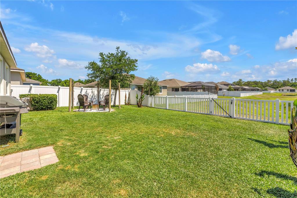 13229 Orca Sound Drive Riverview, FL 33579 - Photo 23 of 37 a view of a garden with a lake
