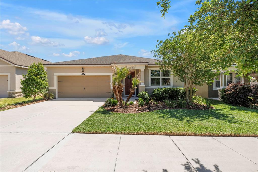13229 Orca Sound Drive Riverview, FL 33579 - Photo 37 of 37 a view of a house with a yard