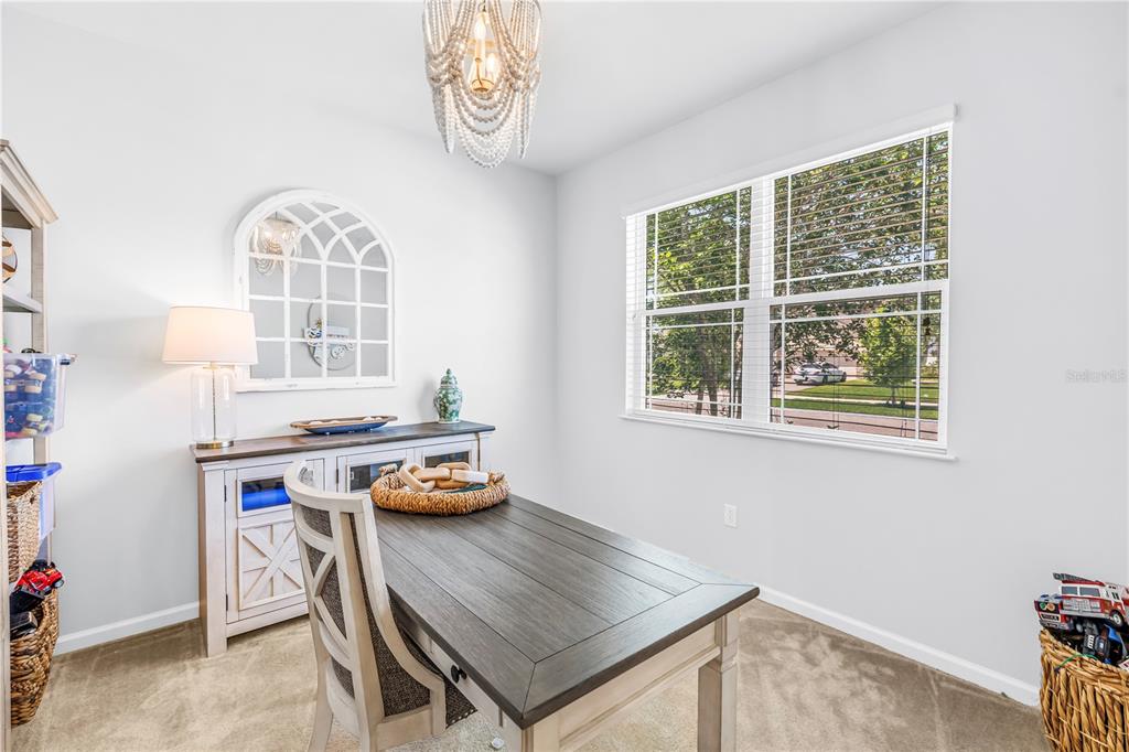13229 Orca Sound Drive Riverview, FL 33579 - Photo 6 of 37 a workspace with furniture and a window
