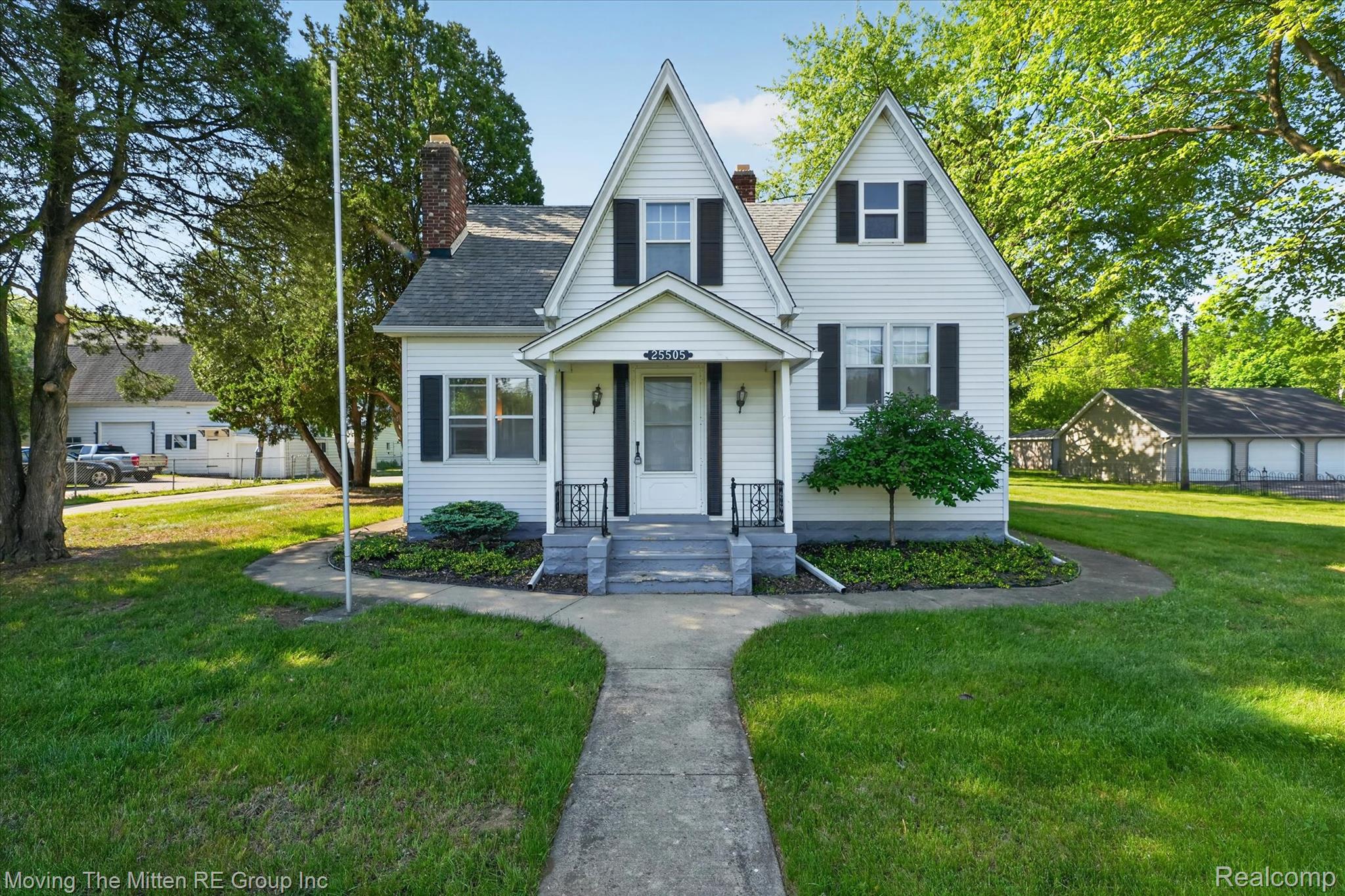 25505 Wick Road Taylor, MI 48180 - Photo 1 of 68 Bungalow with a chimney, a front yard, and covered porch