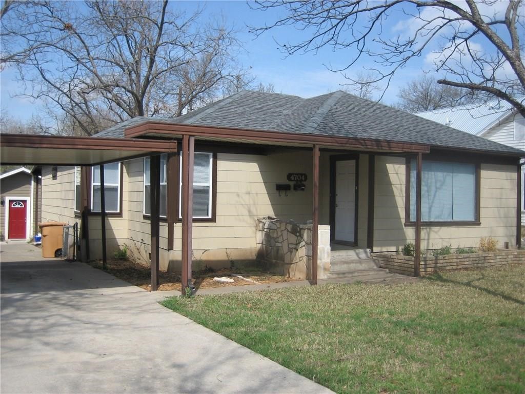 4704 Evans Avenue, Unit A Austin, TX 78751 - Photo 1 of 5 a front view of a house with garden